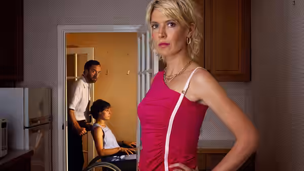 Jill Tyrrell (Julia Davis) stands with hands on hips in a kitchen