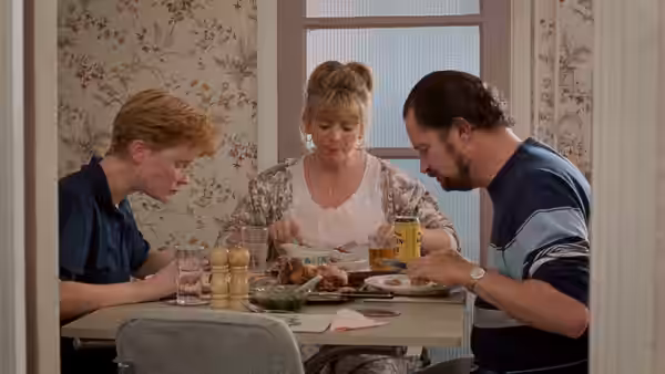 Natalie (Claire Skinner) Wendy (Alison Steadman) and Andy (Jim Broadbent) eat dinner at a table