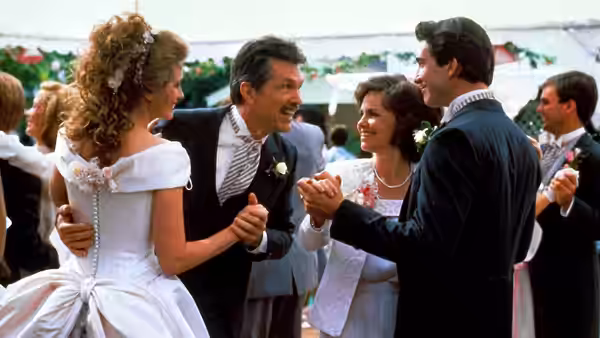 Shelby Eatenton (Julia Roberts) and Drum Eatenton (Tom Skerritt) celebrate at a wedding reception