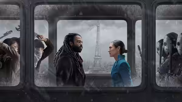 Andre Layton (Daveed Diggs) and Melanie Cavill (Jennifer Connelly) face each other before the Eiffel Tower
