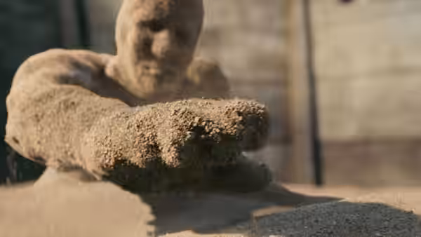 Sandman (Thomas Haden Church) forms from a mound of sand