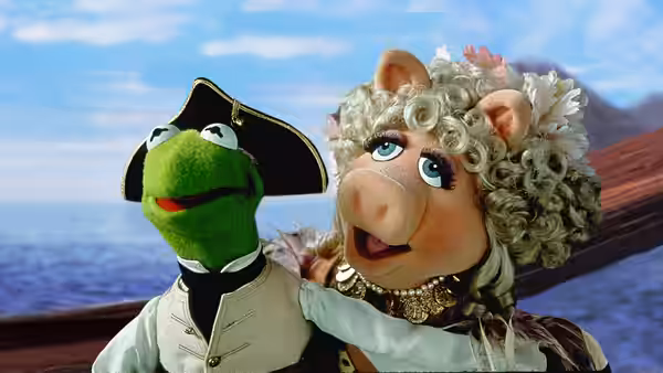 Kermit the Frog and Miss Piggy in pirate costumes aboard a ship