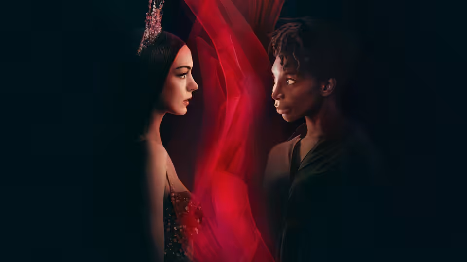 Mother Mary (Anne Hathaway) faces Sam Anselm (Michaela Coel) amid swirling red fabric