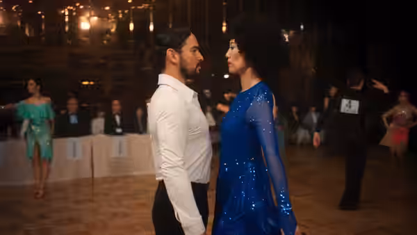 Haru (Rinko Kikuchi) and Fedir (Alberto Guerra) dancing closely on the floor