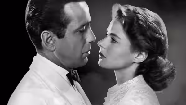 Rick Blaine (Humphrey Bogart) and Ilsa Lund (Ingrid Bergman) gaze at each other closely