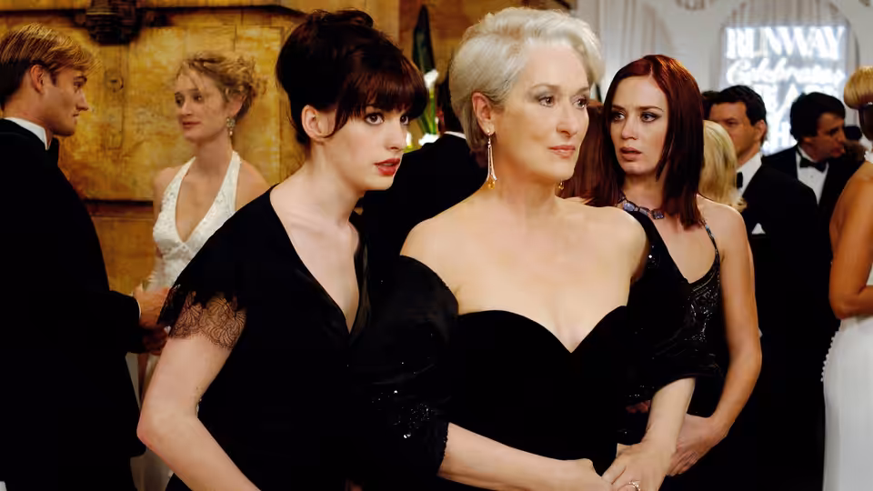 Miranda Priestly (Meryl Streep) and Andy Sachs (Anne Hathaway) at a formal event