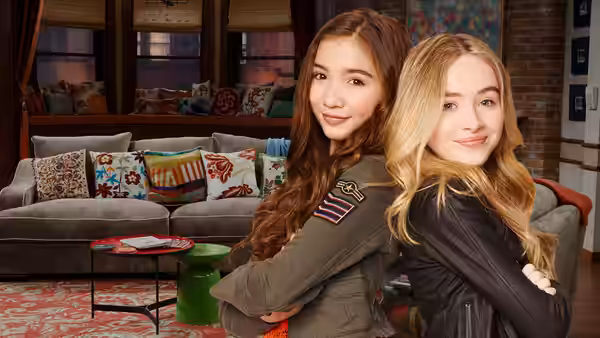 Riley Matthews (Rowan Blanchard) and Maya Hart (Sabrina Carpenter) pose together