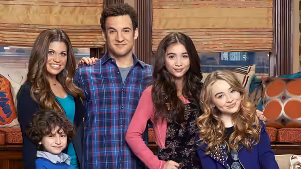 Cory Matthews (Ben Savage) with Topanga Matthews (Danielle Fishel) and children pose