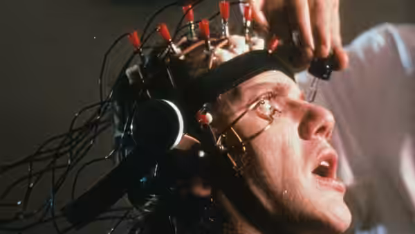 Alex (Malcolm McDowell) with electrodes attached to his head during the Ludovico treatment