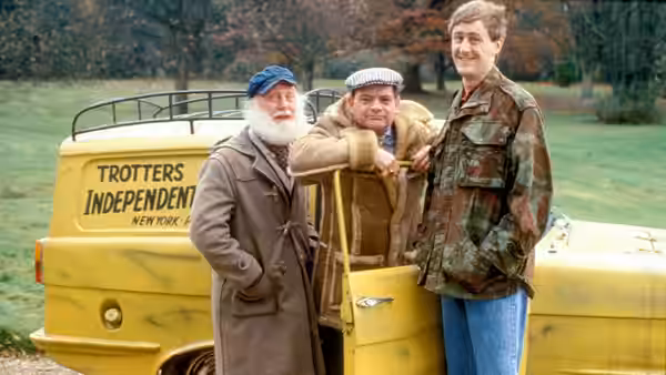 Uncle Albert (Buster Merryfield) Del Boy (David Jason) and Rodney (Nicholas Lyndhurst) pose by the van