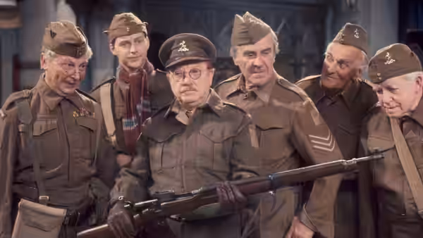 Home Guard soldiers standing in a group with one holding a rifle