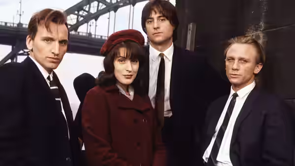 Nicky Hutchinson (Christopher Eccleston) and Geordie Peacock (Daniel Craig) with two companions by a bridge