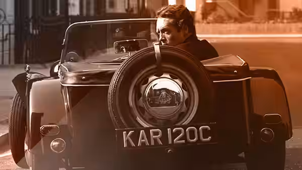 Number Six (Patrick McGoohan) at the wheel of a vintage car