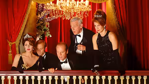 Frasier (Kelsey Grammer) and Niles (David Hyde Pierce) with Martin (John Mahoney) at a balcony