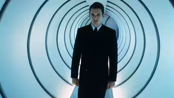 Vincent Freeman (Ethan Hawke) stands in a circular white corridor