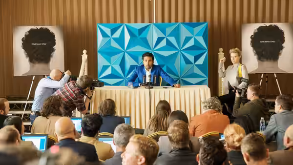 Jack Malik (Himesh Patel) speaking at a press conference before an audience