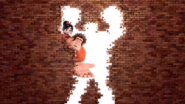 Ralph (John C. Reilly) and Vanellope (Sarah Silverman) breaking through a brick wall