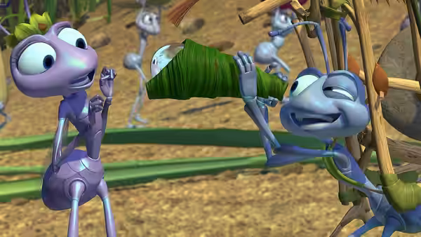 Princess Atta watches Flik demonstrate a rolled leaf among the stalks
