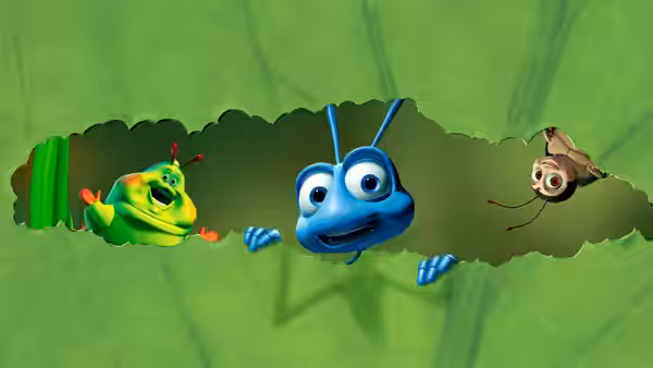 Dot and Flik peer through a torn leaf as a moth flies nearby