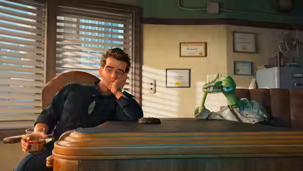 Raymond Gunn (Sam Rockwell) sits at his desk as a green alien leans over the counter
