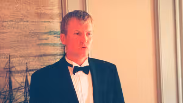 Christian (Ulrich Thomsen) looking concerned in close-up