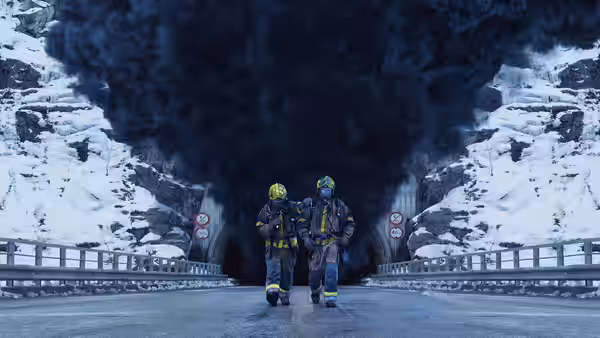 Two firefighters in rescue gear walk from a smoke-filled tunnel onto a snowy mountain road