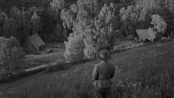 A hat-wearing figure looks out over a rural homestead from a hillside