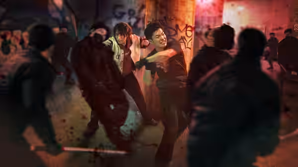A man swings at an opponent as others close in around them
