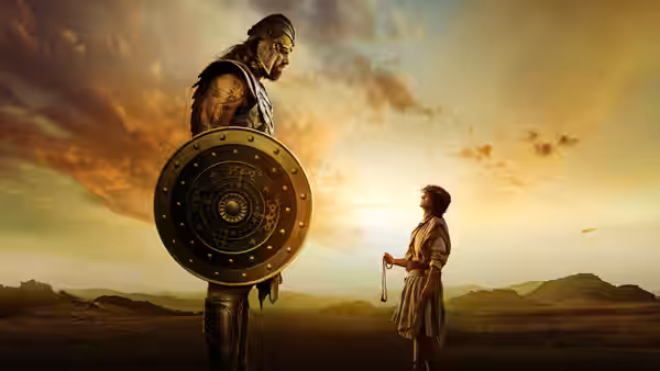 An armored warrior with a shield faces a young shepherd holding a sling