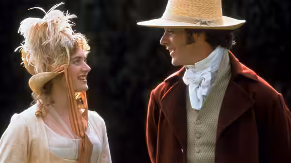 Marianne Dashwood (Kate Winslet) smiling up at John Willoughby (Greg Wise) outdoors