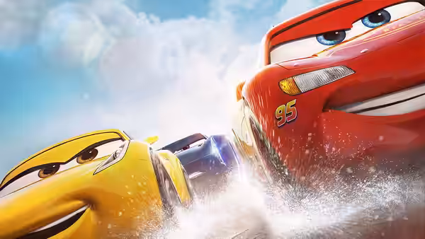 Lightning McQueen and Cruz Ramirez race side by side through a cloud of dirt