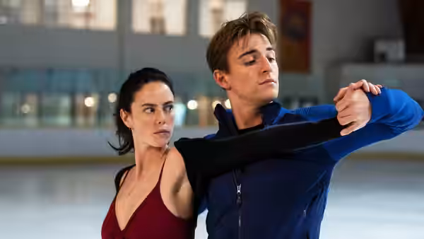 Katarina Baker (Kaya Scodelario) and Justin Davis (Evan Roderick) practice a pairs skating pose