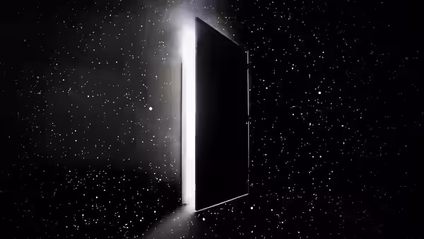 A dark doorway floats open in a star-filled sky