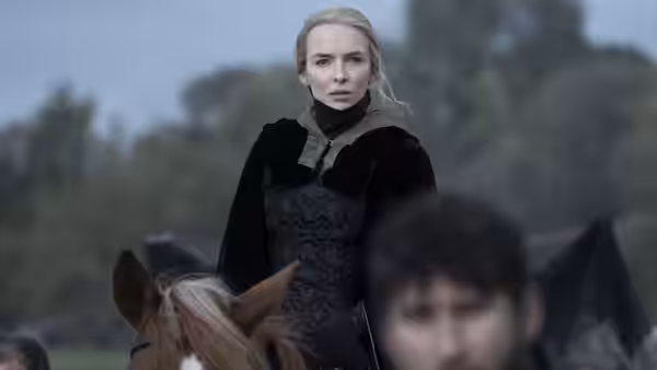 Marguerite de Carrouges (Jodie Comer) sits on horseback among other riders