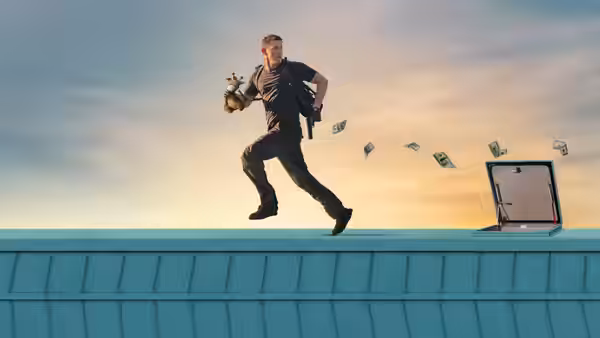 Jeffrey Manchester (Channing Tatum) runs across a rooftop as cash flies behind him
