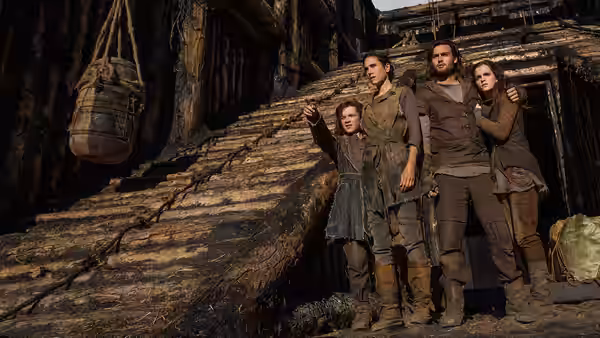 Ham, Shem, Ila and Noah stand together on the wooden ark's steps
