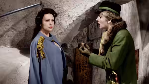 Lola Montes (Martine Carol) faces Franz Liszt (Will Quadflieg) in a stone passage