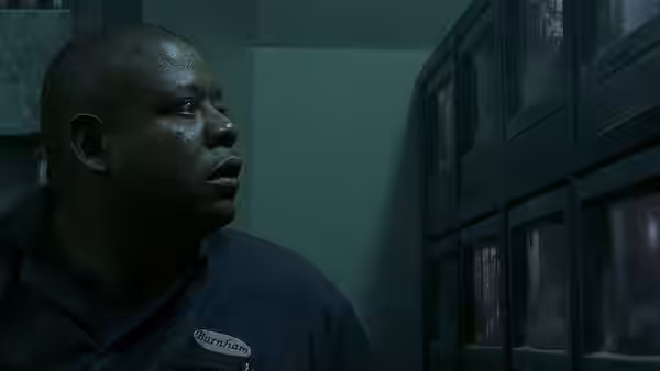 Burnham (Forest Whitaker) looks toward a bank of security monitors