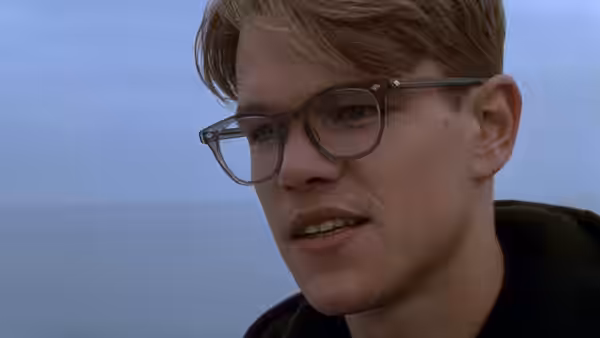 Tom Ripley (Matt Damon) speaks while looking out over the water
