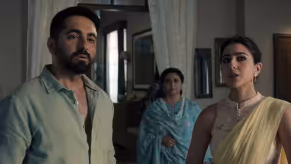 Bilal Ahmad (Ayushmann Khurrana) and Yamini (Sara Ali Khan) stand with a woman indoors