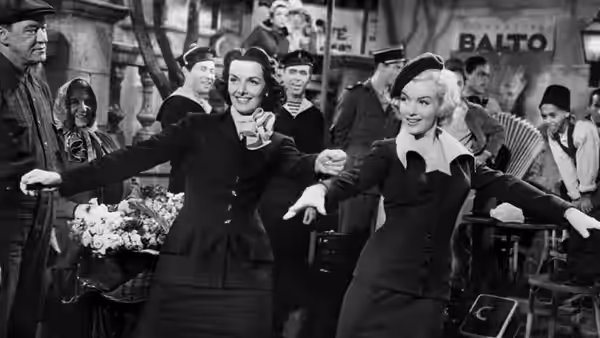 Dorothy Shaw (Jane Russell) and Lorelei Lee (Marilyn Monroe) dance at a train station