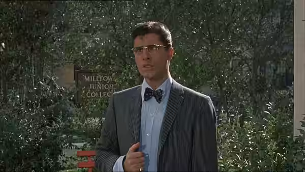 Herbert H. Heebert (Jerry Lewis) stands outside at night in a tuxedo and bow tie