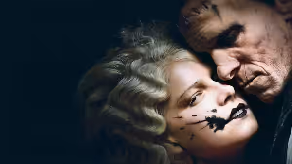 Woman with face paint leans close to a man with stitched forehead