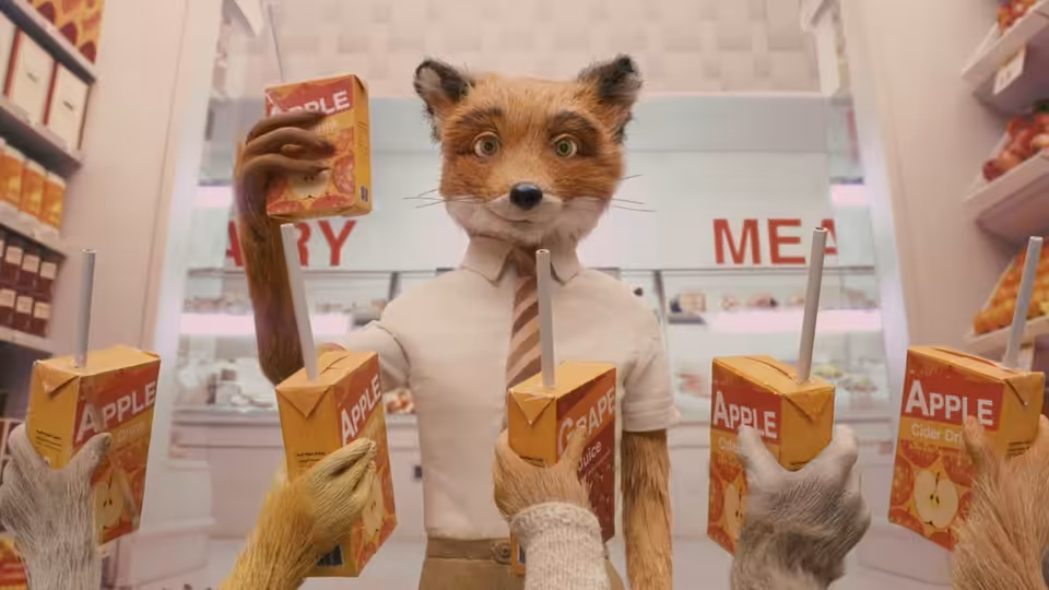 An orange fox in a shirt holds an apple juice box above reaching paws in a supermarket