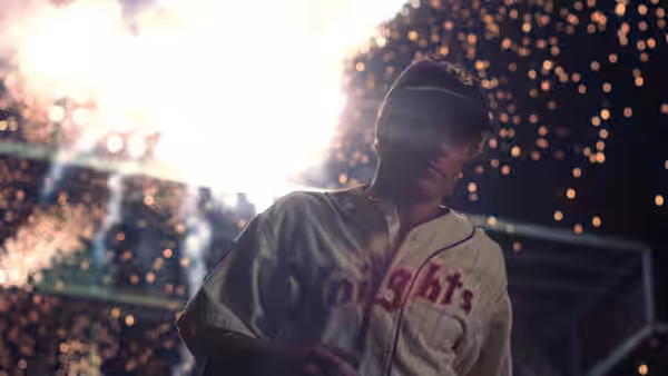 Roy Hobbs (Robert Redford) stands beneath fireworks in his Knights uniform