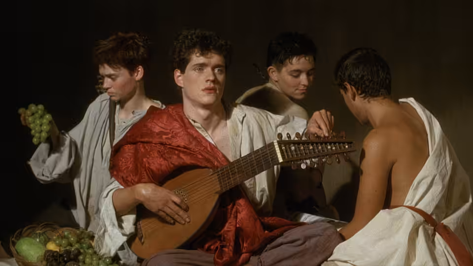 A young man in a red drape plays a lute among three companions