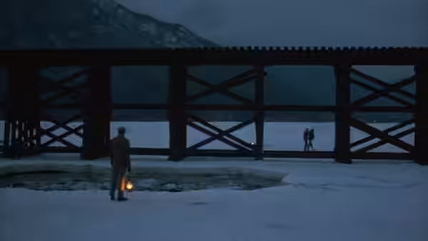 A person carries a lantern beneath a wooden trestle as two figures stand across the frozen lake