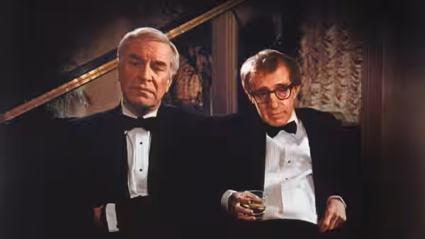 Judah Rosenthal (Martin Landau) and Cliff Stern (Woody Allen) sit together in tuxedos
