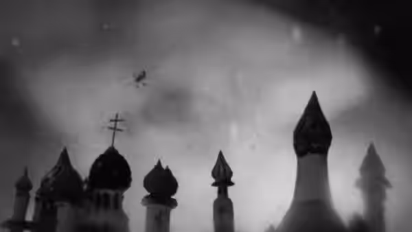 A small aircraft passes above a row of onion-domed rooftops