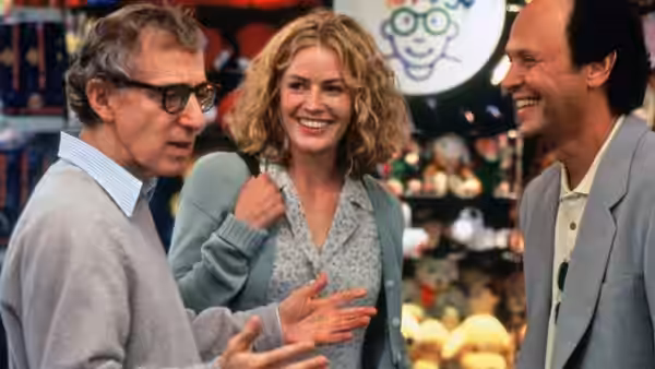 Harry (Woody Allen), Fay (Elisabeth Shue) and a smiling man meet among shop displays